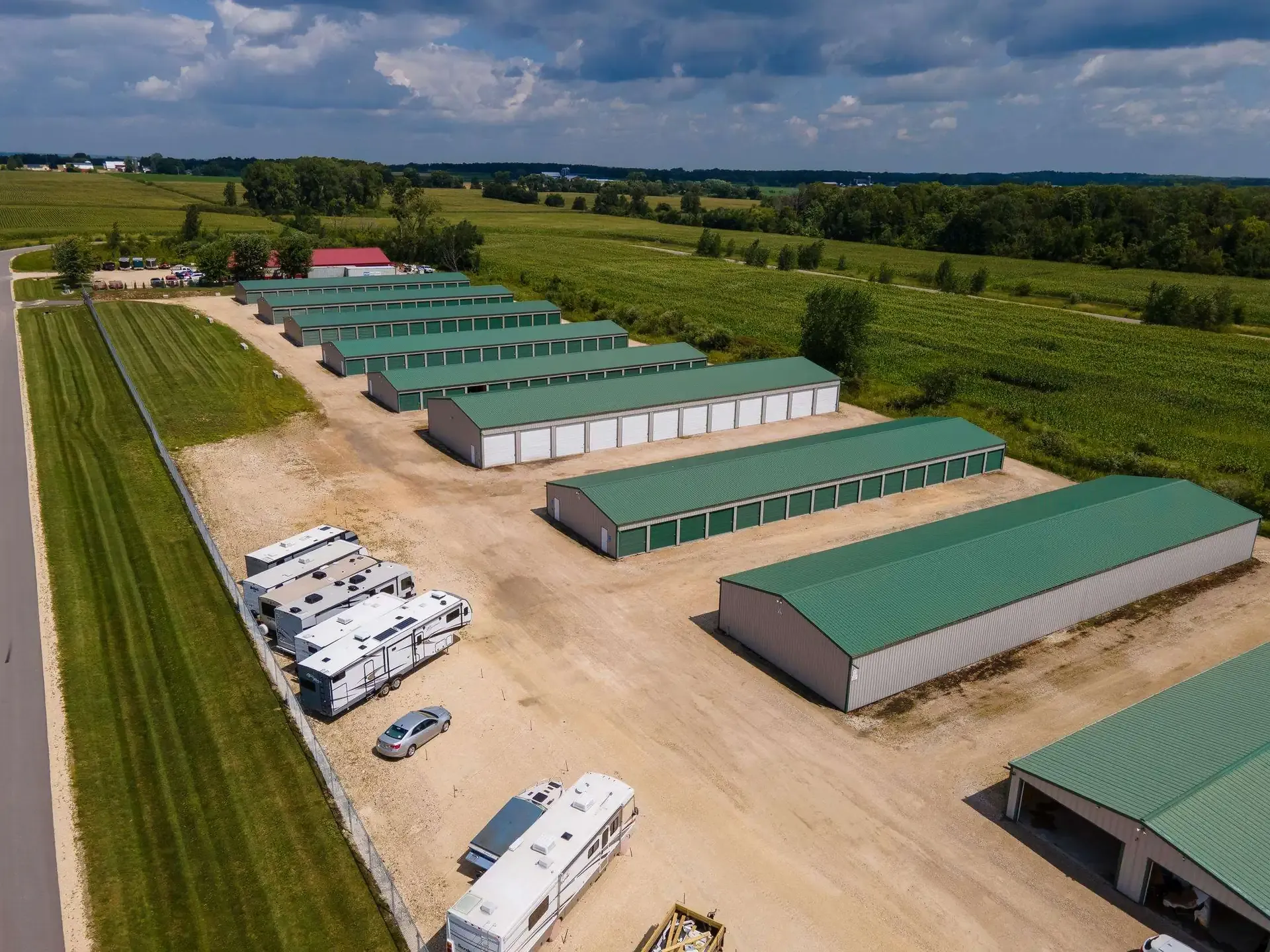 Aerial view of self storage facility with drive up storage and boat, rv, and car parking.